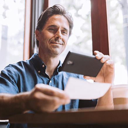 Man making mobile check deposit